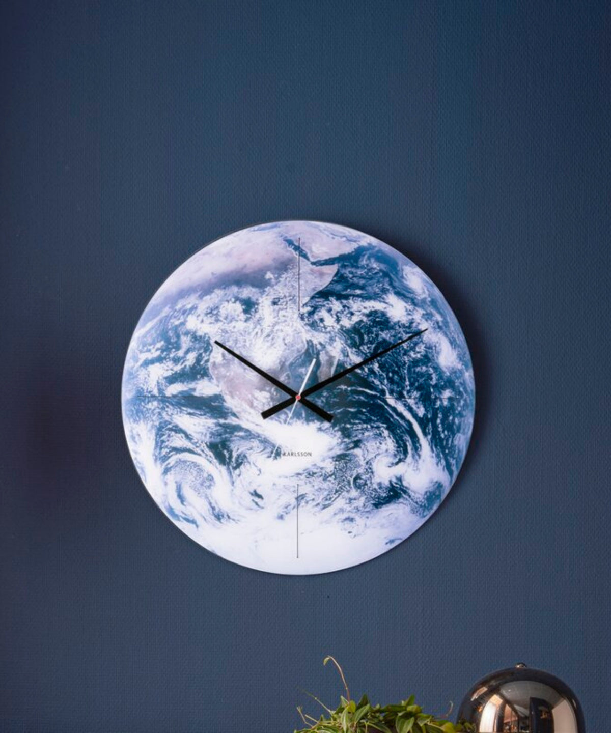Earth Glass Wall Clock on wall display