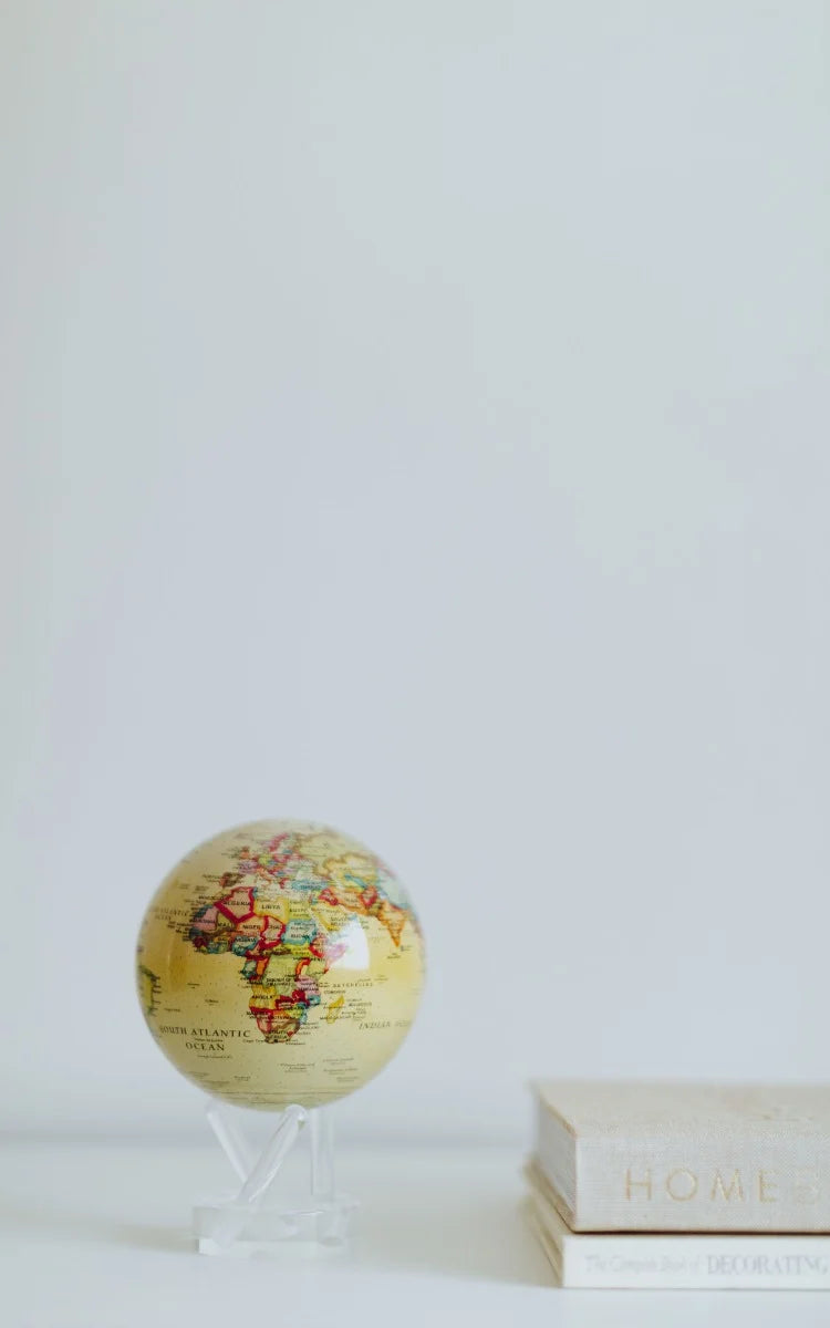 Globe Map on table with a book