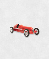 Vintage racing silberfeil car model inspired by classic Grand Prix racers and Silver Arrow legends, featuring a red race car body with a striking black seat. A collectible car model for motorsport and classic car enthusiasts. Viewed from a diagonal perspective
