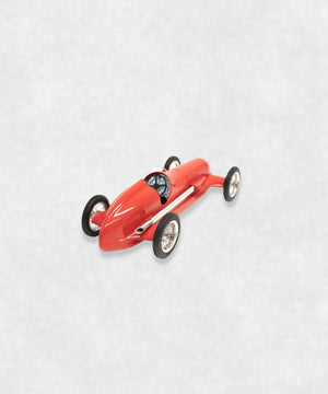 Vintage racing silberfeil car model inspired by classic Grand Prix racers and Silver Arrow legends, featuring a red race car body with a striking black seat. A collectible car model for motorsport and classic car enthusiasts. Viewed from a diagonal perspective of its back