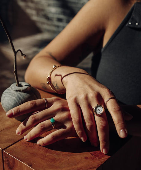 Ring watch Alpine white by Maison Davis worn on a woman’s hand – elegant ring watch collection