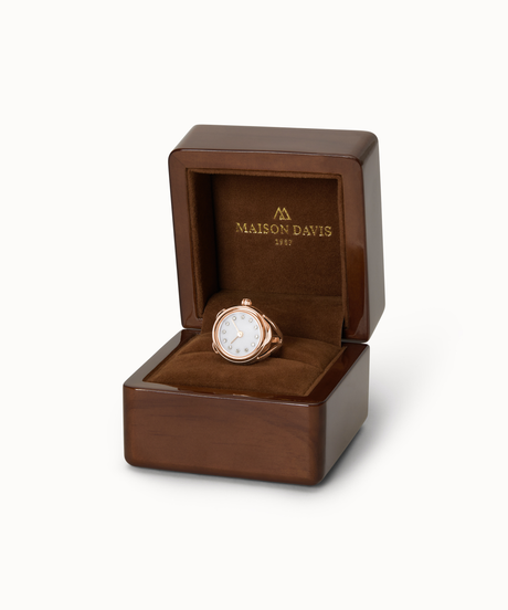 Ring watch Maison Davis in rose gold with white jade dial, crystal markers, Swiss made. In a wooden box.